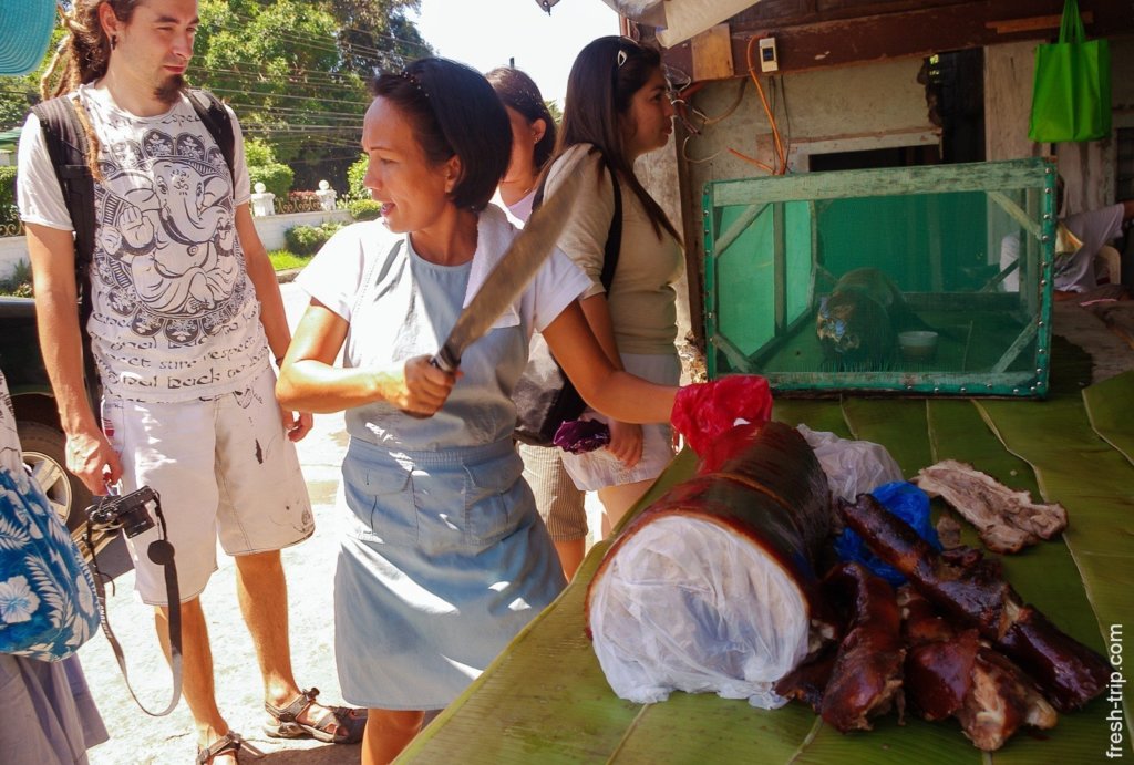 Locals and lechon, Philippines